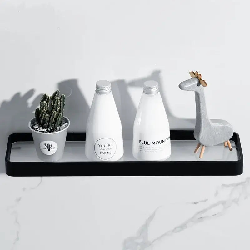 Decorbites black glass bathroom shelf corner rack with black glass rectangular aluminum frame holding decorative items
