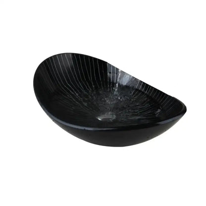 Black ceramic vessel sink with glossy finish and vertical striations in decorbites black glass bathroom sink set