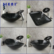 Decorbites black glass bathroom sink set with hand painted design features a sleek black glass vessel sink with radial etching