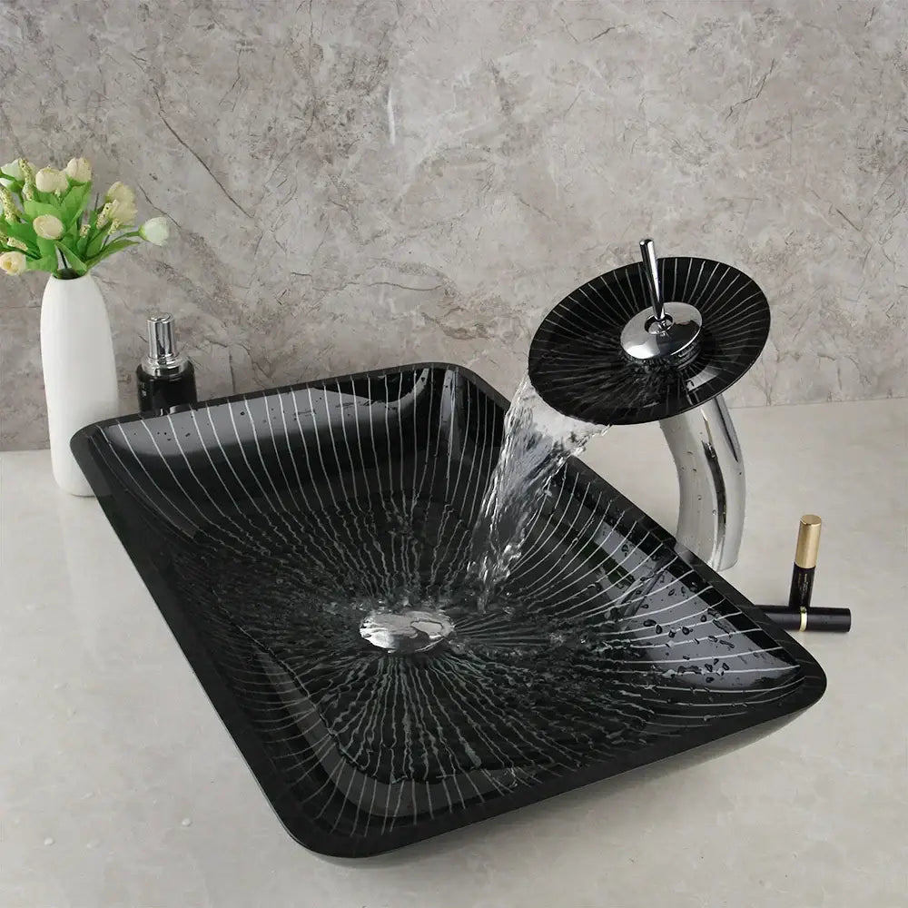 Decorbites black glass bathroom sink set with hand painted radial white lines and chrome waterfall faucet