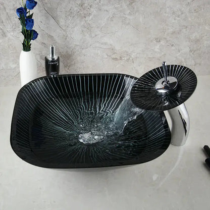 Decorbites black glass bathroom sink set with hand painted white radial stripes and chrome waterfall faucet