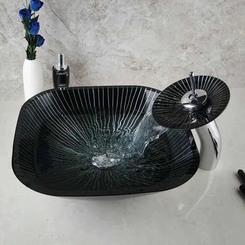Decorbites black glass bathroom sink set with hand painted white radial stripes and chrome waterfall faucet