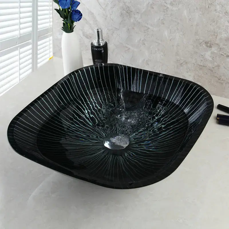 DecorBites black glass bathroom sink set with hand painted white radial stripes and glossy finish with waterfall faucet