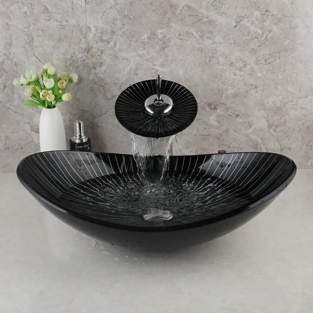 Decorbites black glass bathroom sink set with hand painted radial white stripes and matching waterfall faucet