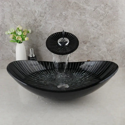 Decorbites black glass bathroom sink set with hand painted radial white stripes and matching waterfall faucet