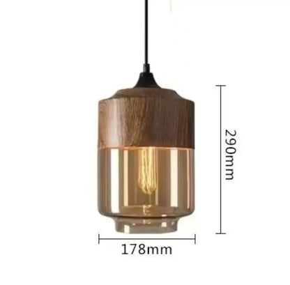 DecorBites™ pendant light fixture with black glass upper section and warm amber glass lower half for modern indoor decor