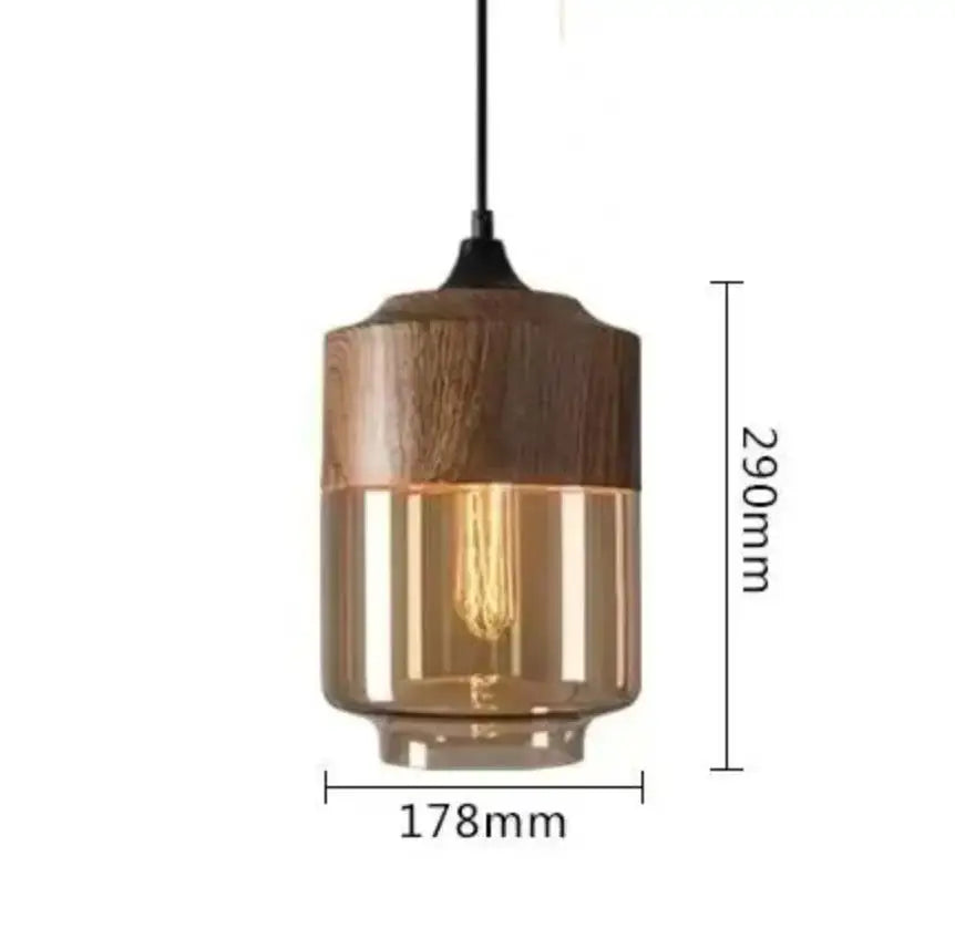 DecorBites™ pendant light fixture with black glass upper section and warm amber glass lower half for modern indoor decor