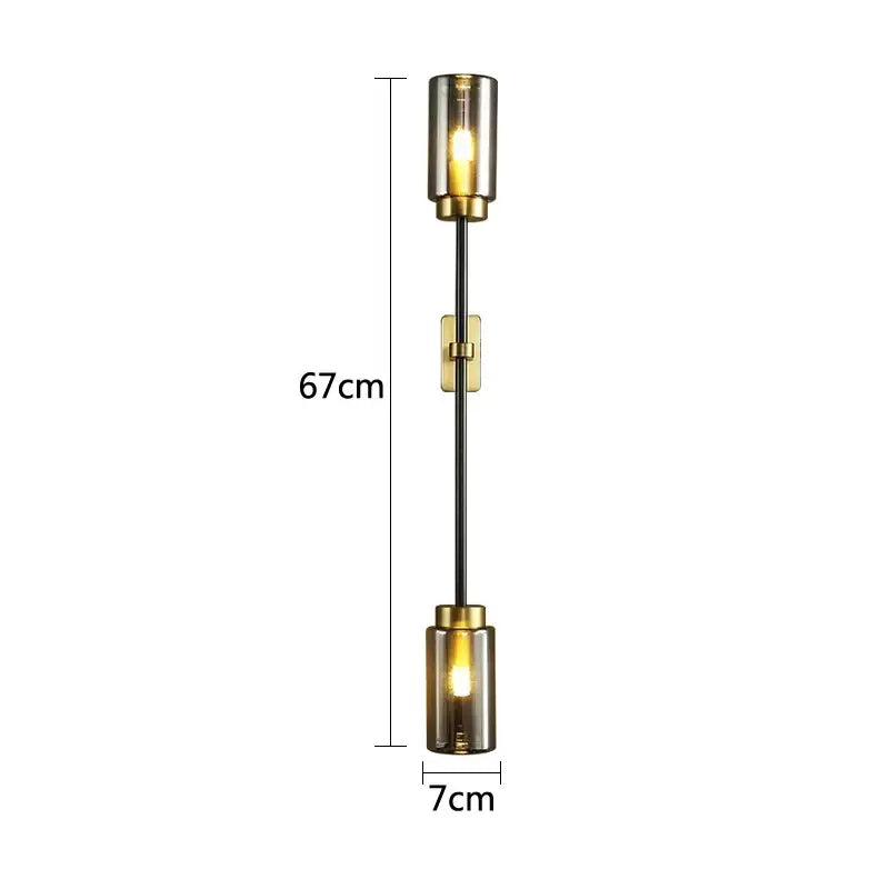 Modern double-ended wall lamp with smoked black glass shades and brass accents by decorbites black glass wall collection