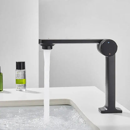 Modern matte black gold basin faucet with sleek minimalist design and integrated control knob by decorbites black gold