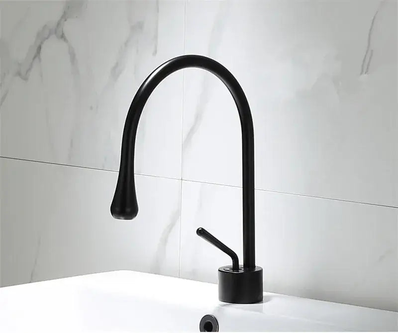 DecorBites black gold basin faucet in black matte finish with curved spout and single lever for kitchen sink use