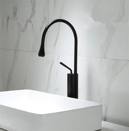 Decorbites black gold basin faucet with black matte finish curved spout and cylindrical base for kitchen sink use