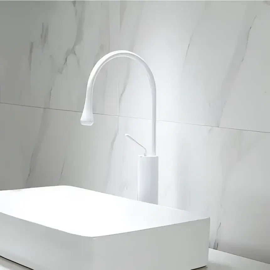 White ceramic basin faucet with sleek curved spout and minimalist design for decorbites black gold basin use