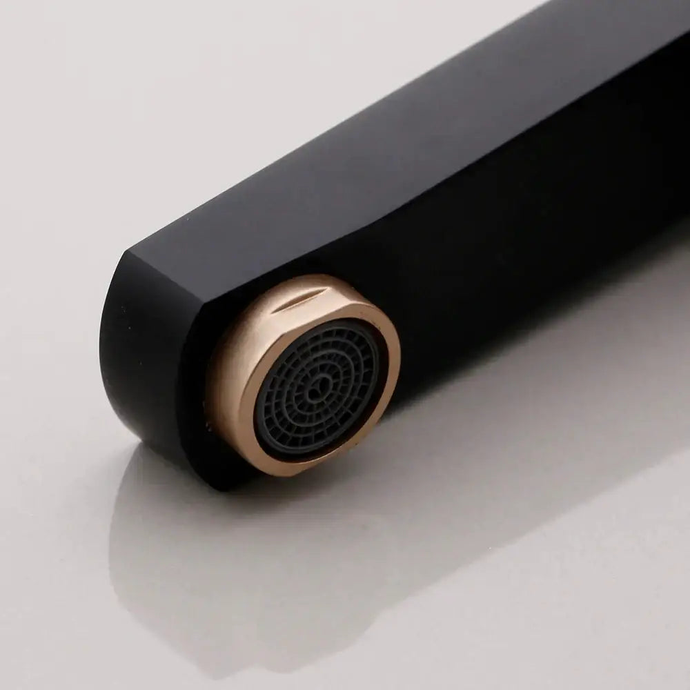 Decorbites black gold bathroom faucet with black matte finish, rose gold spout, and textured nozzle in brass aluminum