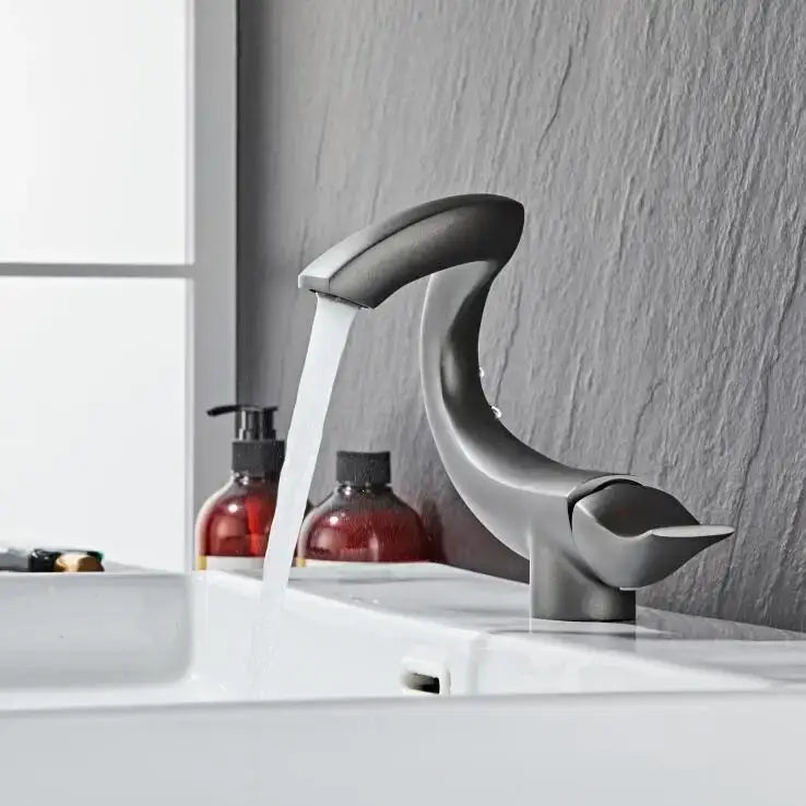 Modern matte black decorbites black gold brass bathroom faucet mixer with sleek curved design and single spout deck mounted
