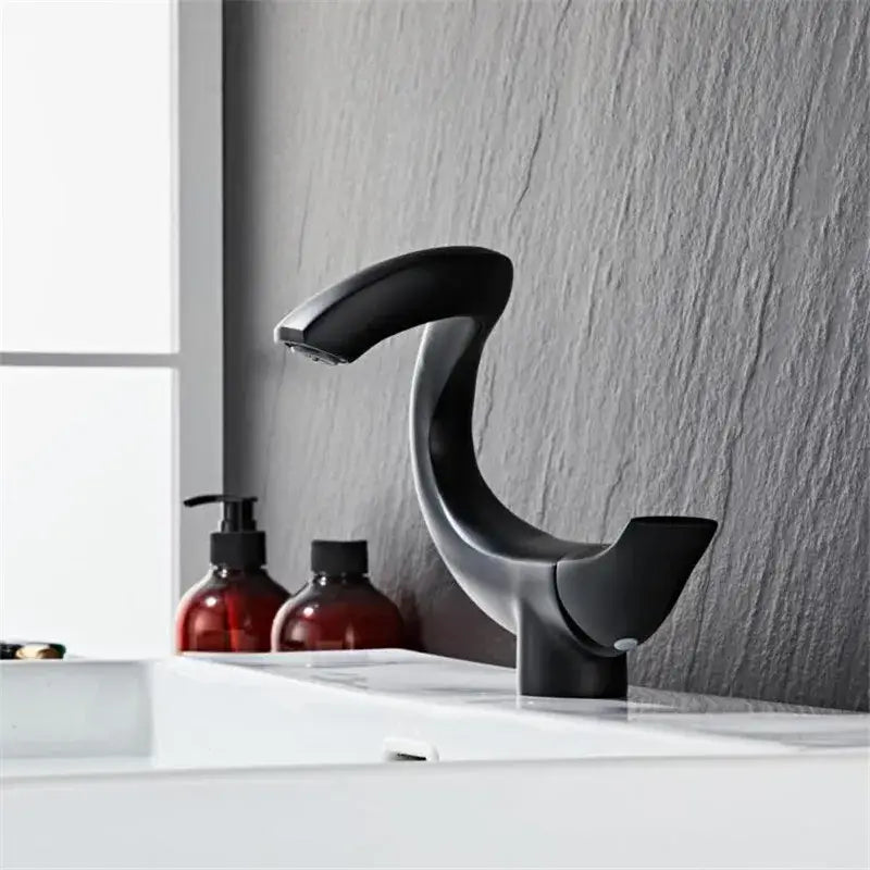 Modern matte black decorbites black gold brass bathroom faucet mixer with sleek curved design single handle deck mounted