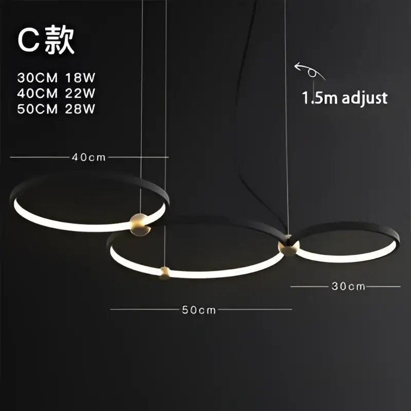 Decorbites black gold chandelier featuring a black minimalist metal pendant with gold spherical connectors and LED rings