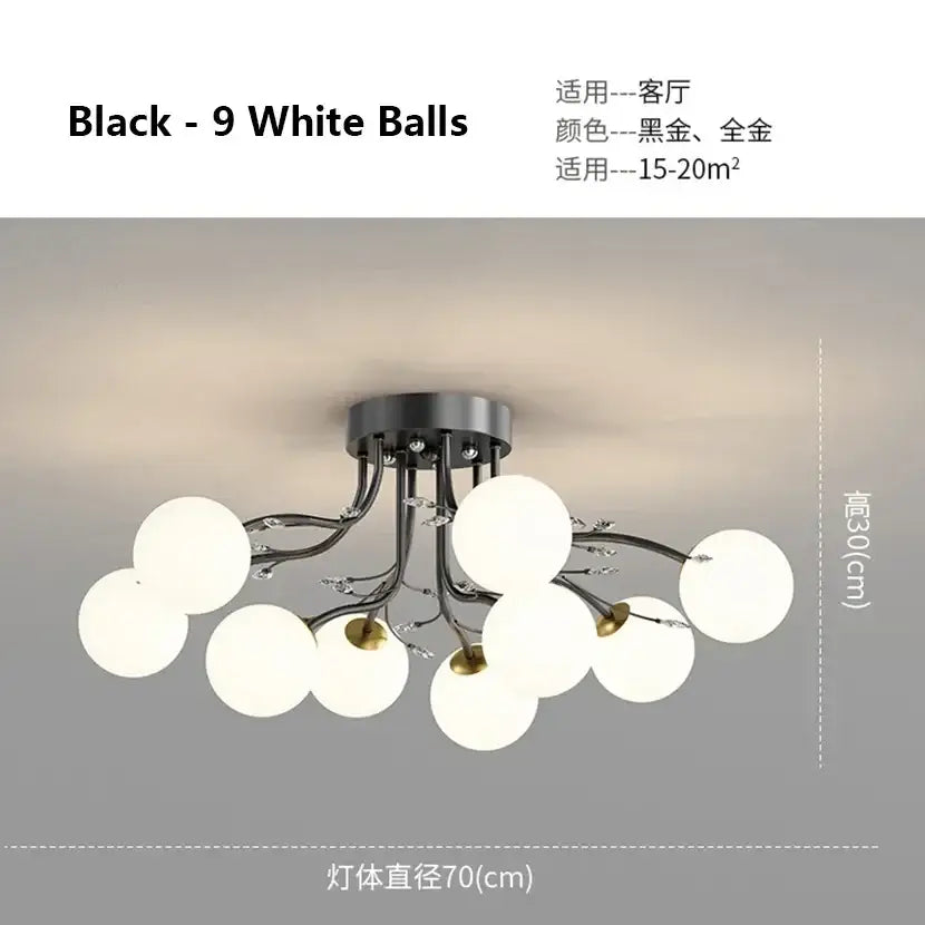 Decorbites black gold chandelier with nine frosted white glass globes in a branching black metal design