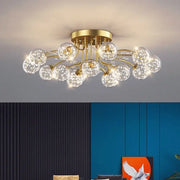 Decorbites black gold chandelier featuring gold-toned fixture with clear glass spheres and crystal accents pendant lights