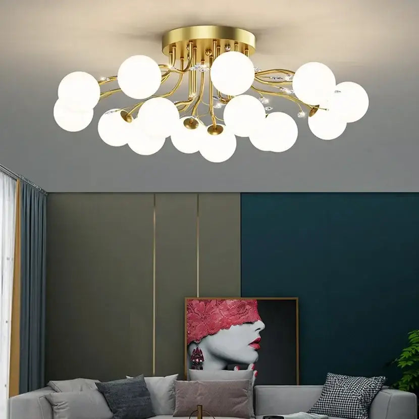 Decorbites black gold chandelier with gold-toned fixture, frosted white spherical bulbs, and clear star glass accents