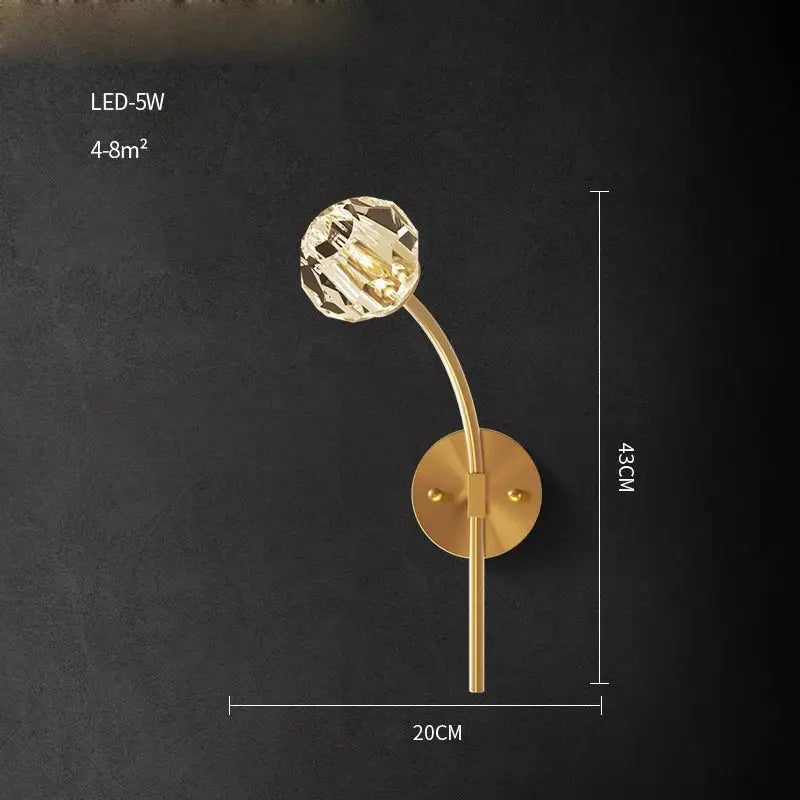 DecorBites black gold copper crystal wall sconce light with gold-toned curved arm and faceted crystal globe for bedroom