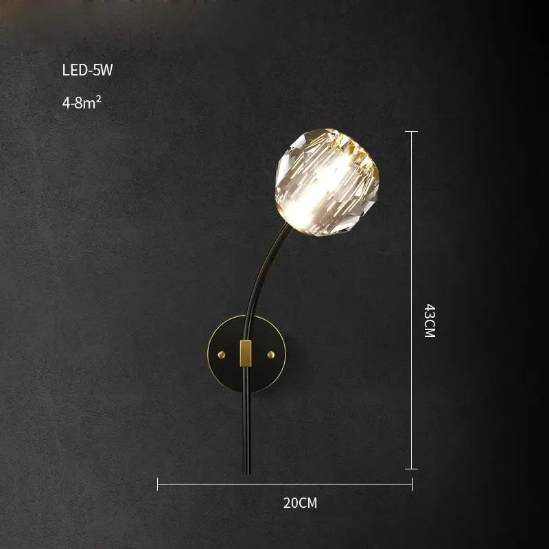 DecorBites black gold copper crystal LED wall sconce light with faceted globe on black curved arm for bedroom corridor