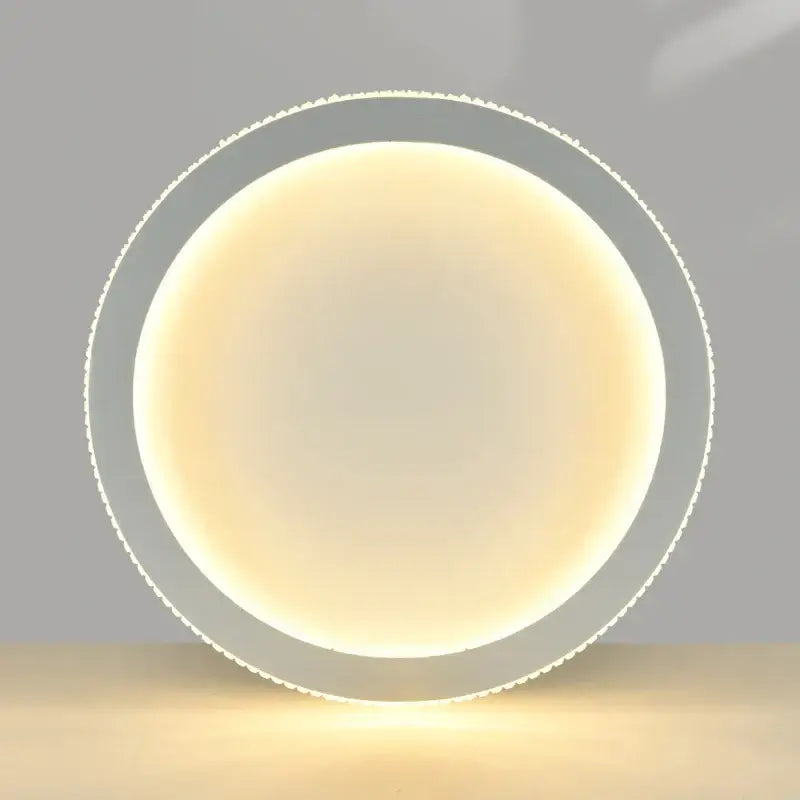 Circular recessed ceiling light with sleek white frame and warm illumination in decorbites black gold crystal chandelier design