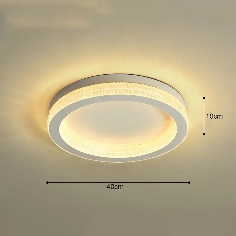 Modern decorbites black gold crystal chandelier ceiling light with sleek white frame and warm glowing LED for living room