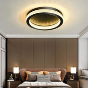 Modern circular ceiling light with black metal frame and warm LED ring by DecorBites black gold crystal chandelier