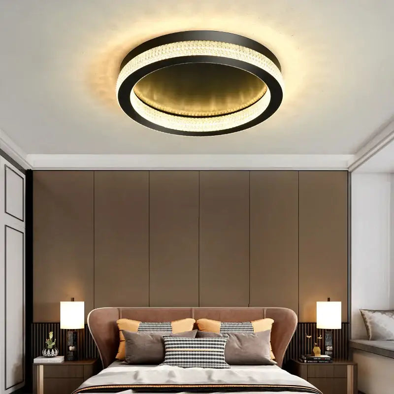 Modern circular ceiling light with black metal frame and warm LED ring by DecorBites black gold crystal chandelier