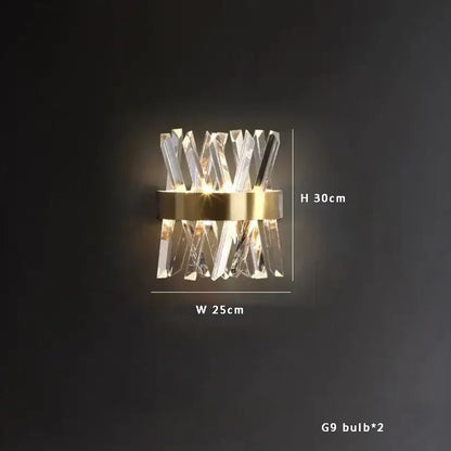 Modern crystal wall sconce with gold-toned metal base and clear glass elements by decorbites black gold pendant lights