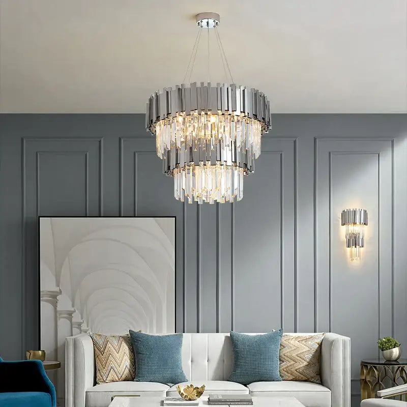 A modern black gold crystal DecorBites lighting fixture with chrome bars and cascading clear crystal prisms chandelier