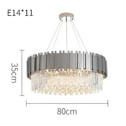 A modern decorbites black gold crystal oval LED lighting fixture with a metallic frame and hanging crystal droplets