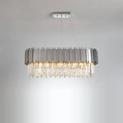 Modern oval decorbites black gold crystal lighting fixture with sleek chrome frame and cascading clear prisms chandelier