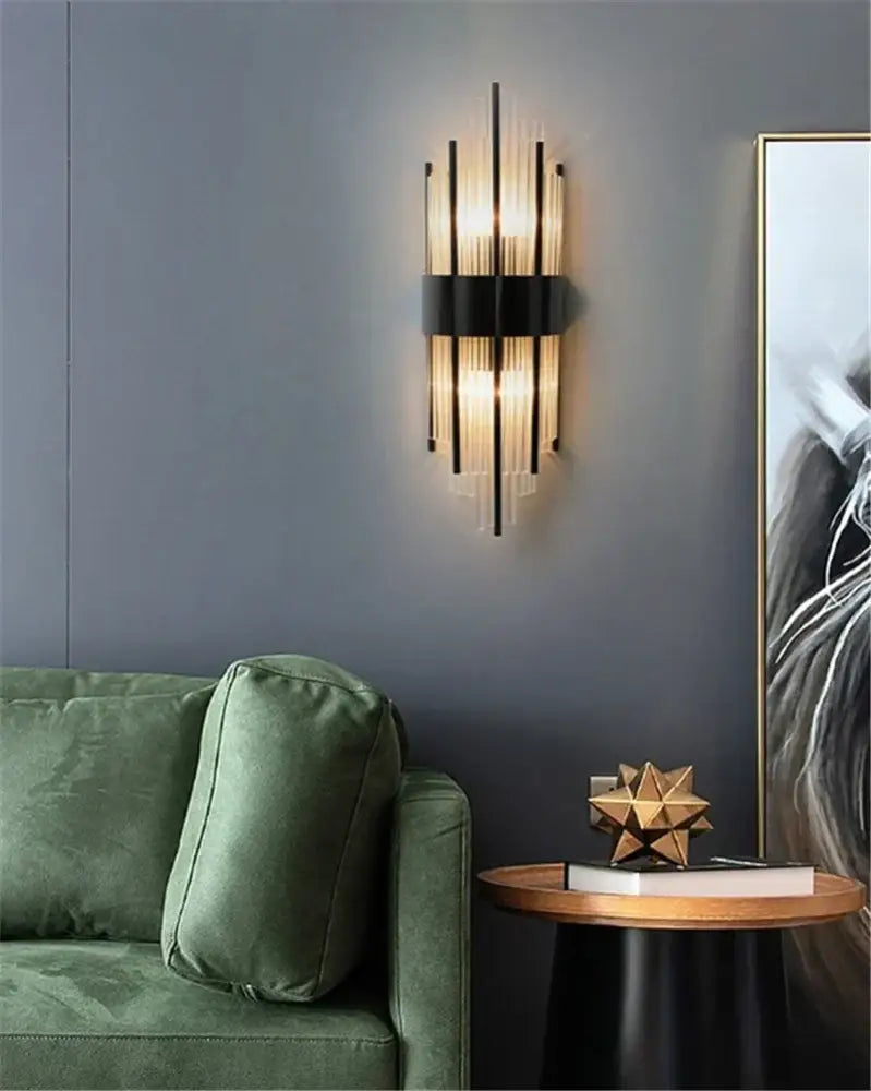 Decorbites black gold crystal modern led wall sconce with vertical glass rods and black metal frame for living room