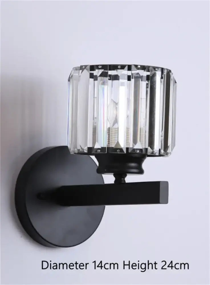 Black gold metal wall sconce with cylindrical crystal shade decorbites black gold modern led bedroom light