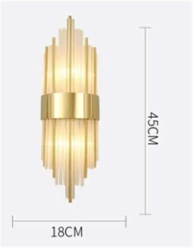 Gold-toned decorbites black gold crystal wall sconce with vertical glass rods and central metallic band for modern interiors