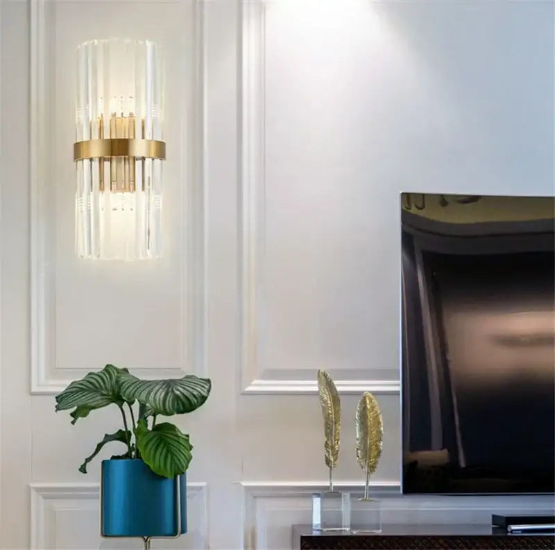 DecorBites black gold crystal wall sconce with vertical crystal rods and brass ring for bedroom and living room lighting