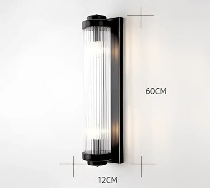 Decorbites black gold crystal wall sconce with black frame and vertical ribbed glass panels for bedroom and living room decor
