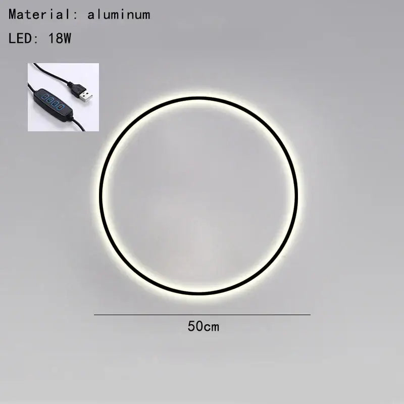 Circular aluminum led wall light with a sleek black frame and usb plug by decorbites black gold for bedroom use