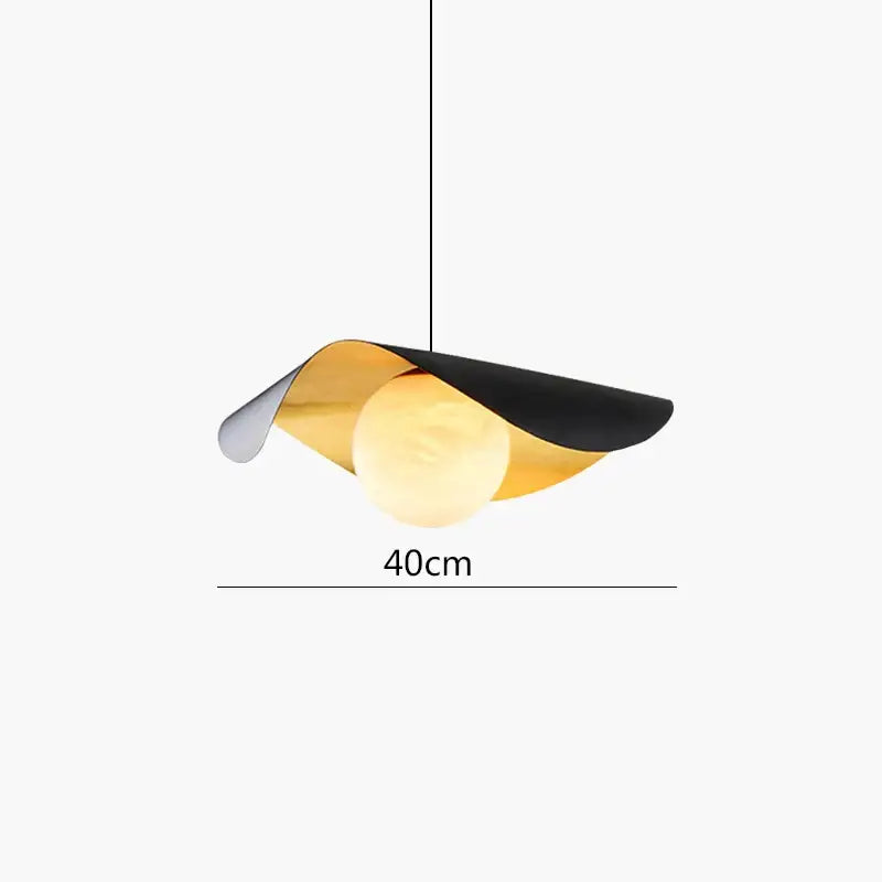Modern pendant light from decorbites black gold featuring black and gold metallic shades over a warm glass bulb
