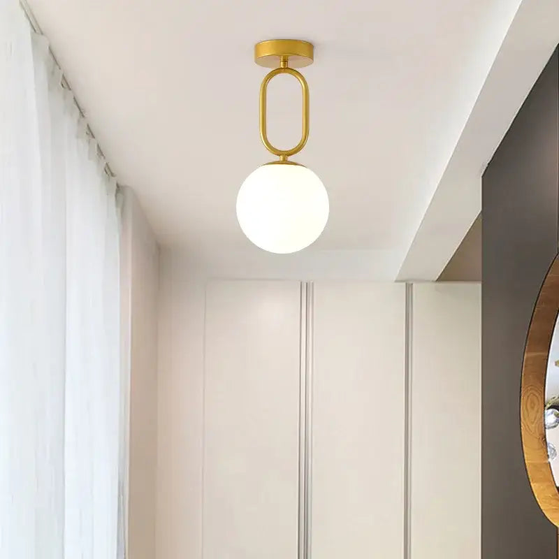 Decorbites black gold glass ceiling lamp with gold-finished pendant and spherical frosted glass globe modern nordic design