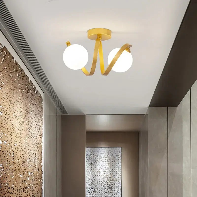 DecorBites black gold glass ceiling light with gold-toned metal arm and two white glass bulbs for modern indoor use