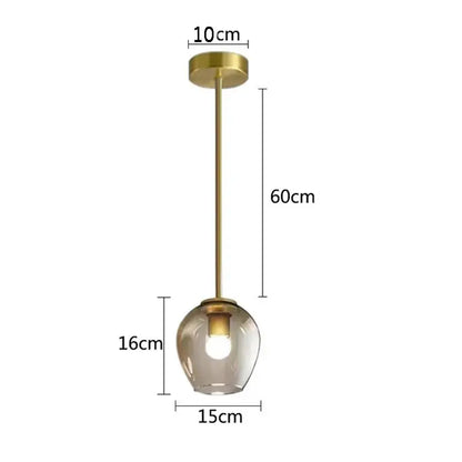 A modern brass-finished pendant wall lamp with a spherical smoked glass shade by DecorBites black gold