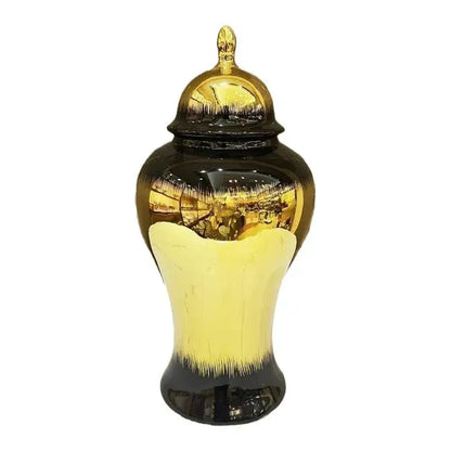A glossy black gold gradated ceramic ginger jar with matching lid from decorbites black gold for home decoration
