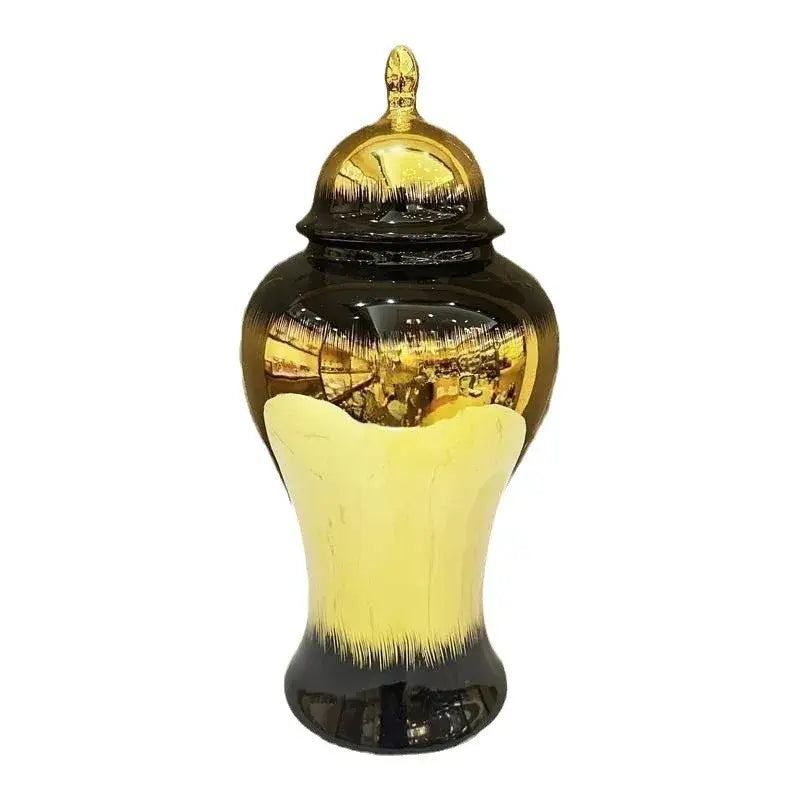 A glossy black gold gradated ceramic ginger jar with matching lid from decorbites black gold for home decoration