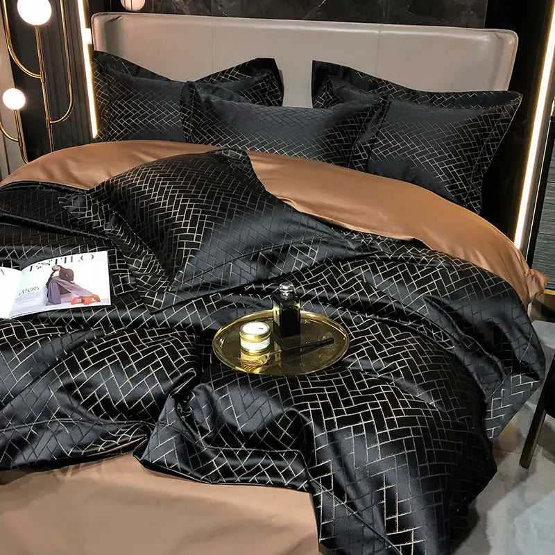 Black satin duvet cover with subtle gold geometric pattern and matching pillows in decorbites black gold egyptian cotton bedding set