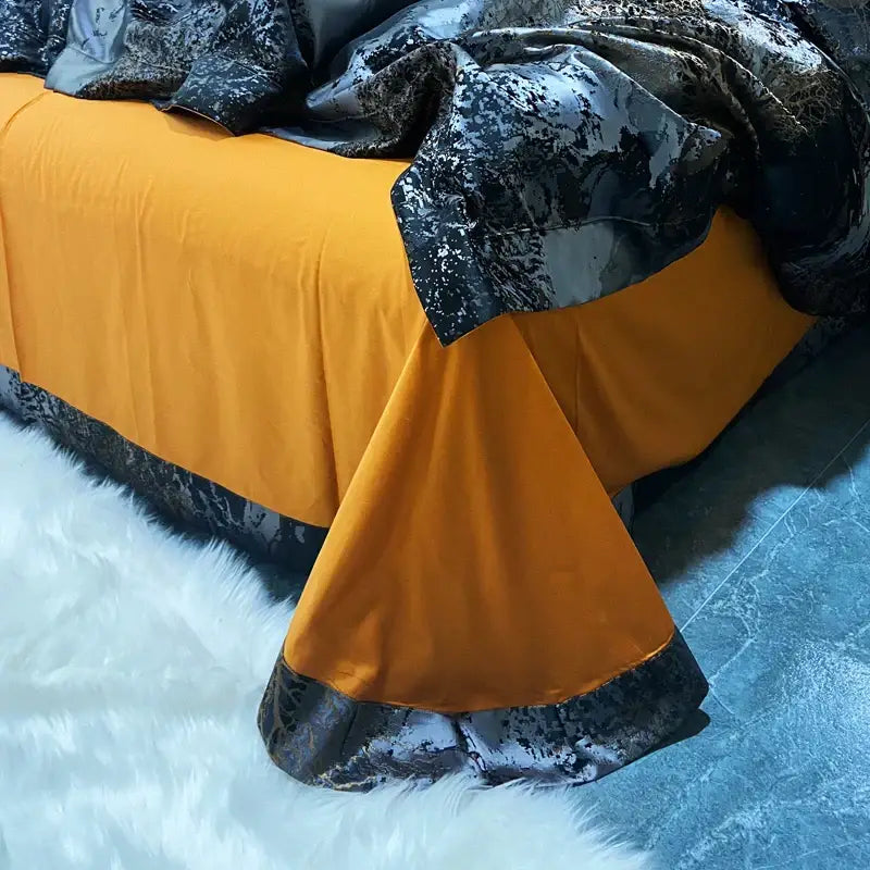 Vibrant orange satin bed skirt with black and silver trim in decorbites black gold egyptian cotton bedding set