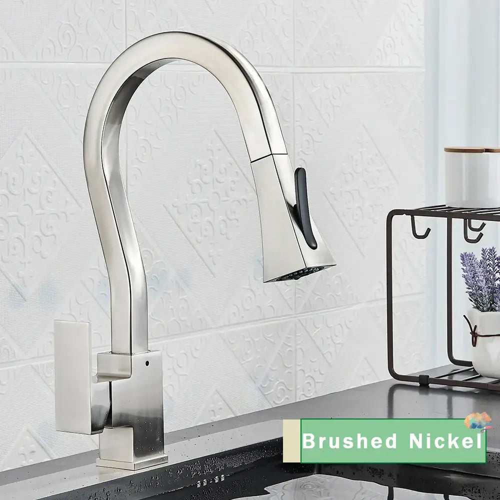 Decorbites black gold kitchen faucet with brushed nickel finish, sleek arched spout, and pull-down spray head