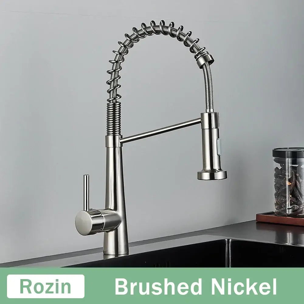 Brushed nickel kitchen faucet with flexible coiled gooseneck spout and pull-down spray head in decorbites black gold style