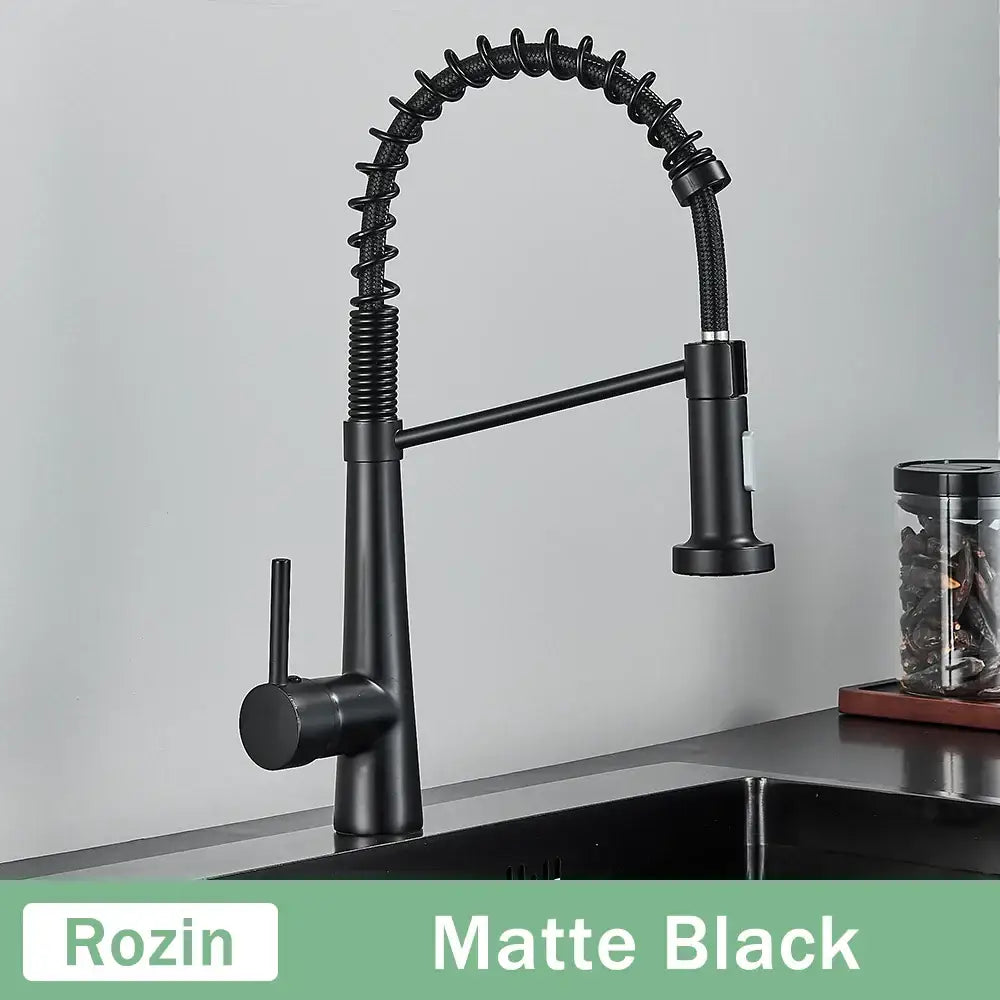 Matte black DecorBites black gold kitchen faucet with flexible coiled gooseneck spout and pull down sprayer
